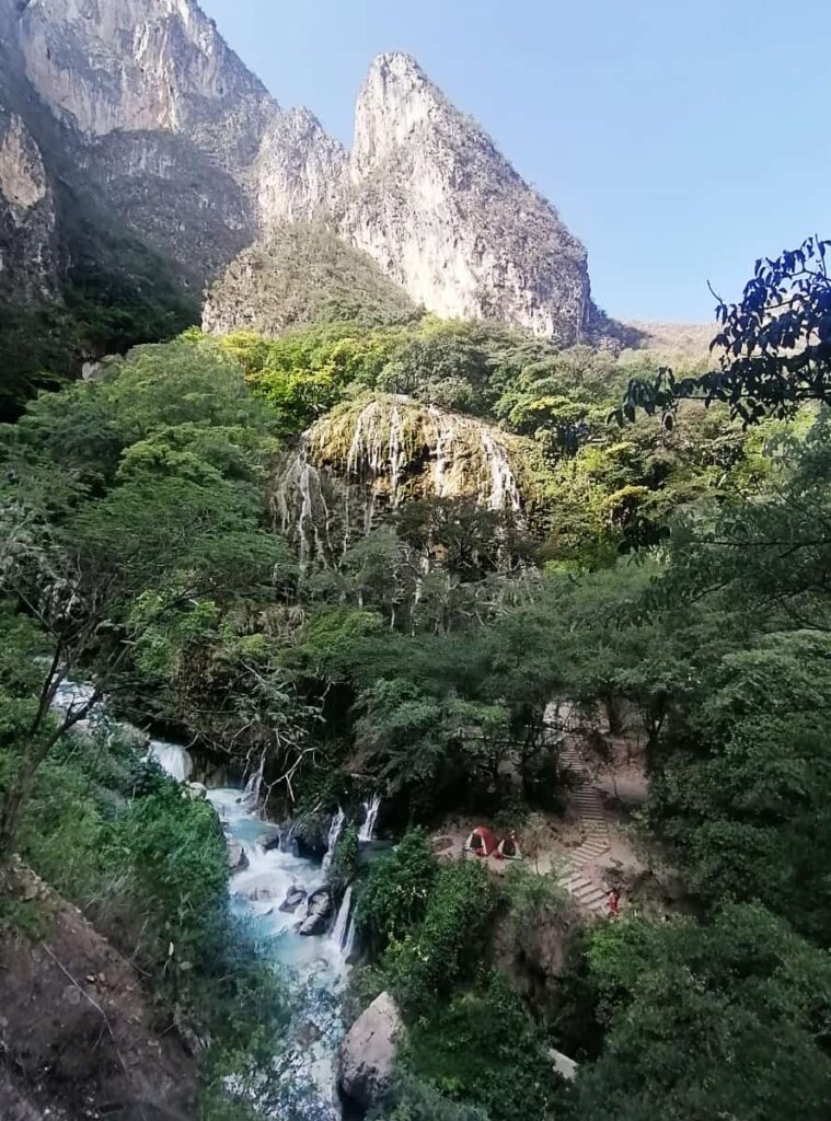 Looking down on the blue thermal river at Grutas Tolantongo, near where the water flows from the cave.