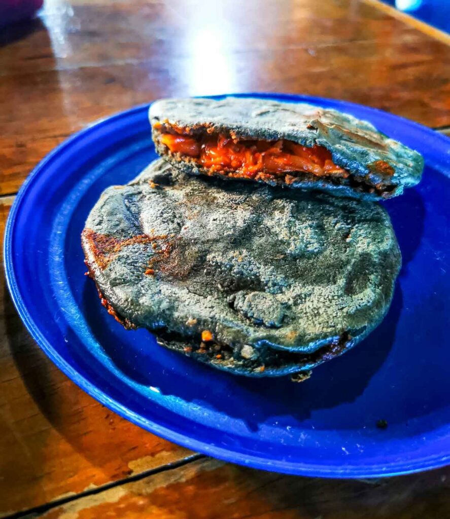 A thick corn tortillas, fried and then stuffed with anything delicious, also known as 'Gorditas' in Santa Clara del Cobre.