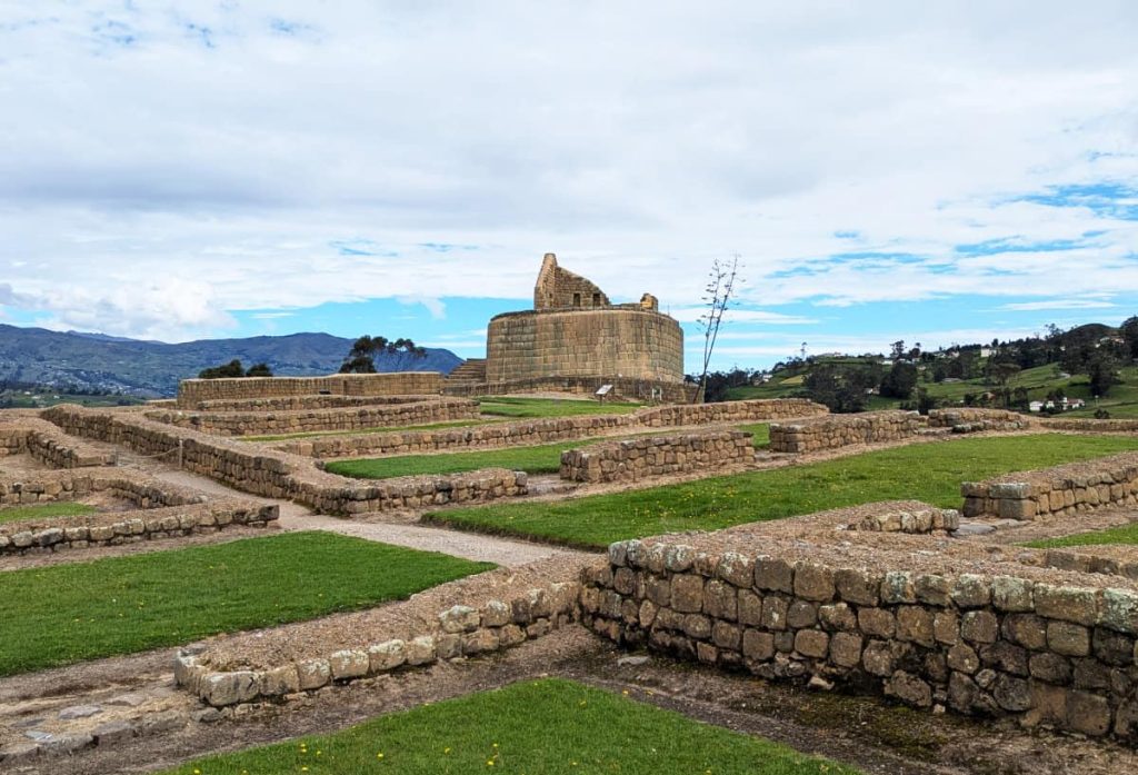 The circular Sun Temple surrounded by stone walls at Ingapirca, Ecuador’s most important Inca site and one of the most popular day trips from Cuenca.